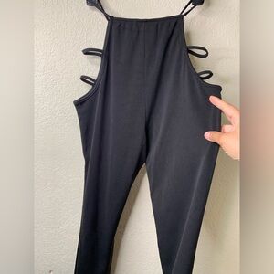 Black sexy cut out pants size s, fits size L